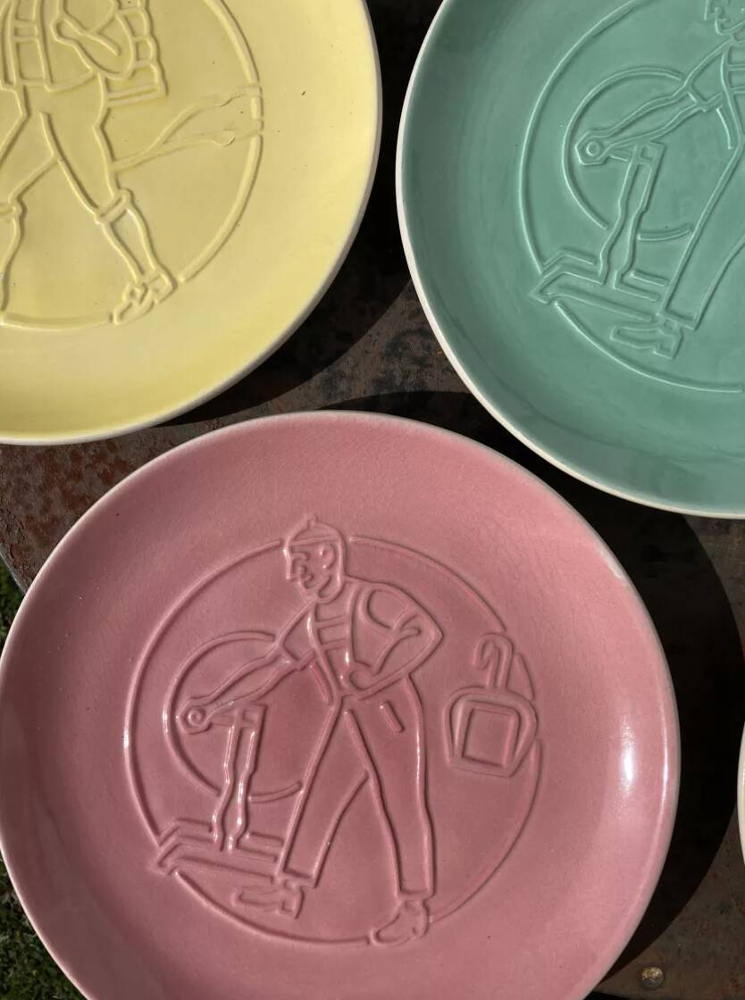 7 multicolored plates with old Nyon porcelain trades