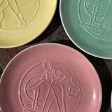 7 assiettes multicolore métiers anciens en porcelaine de Nyon