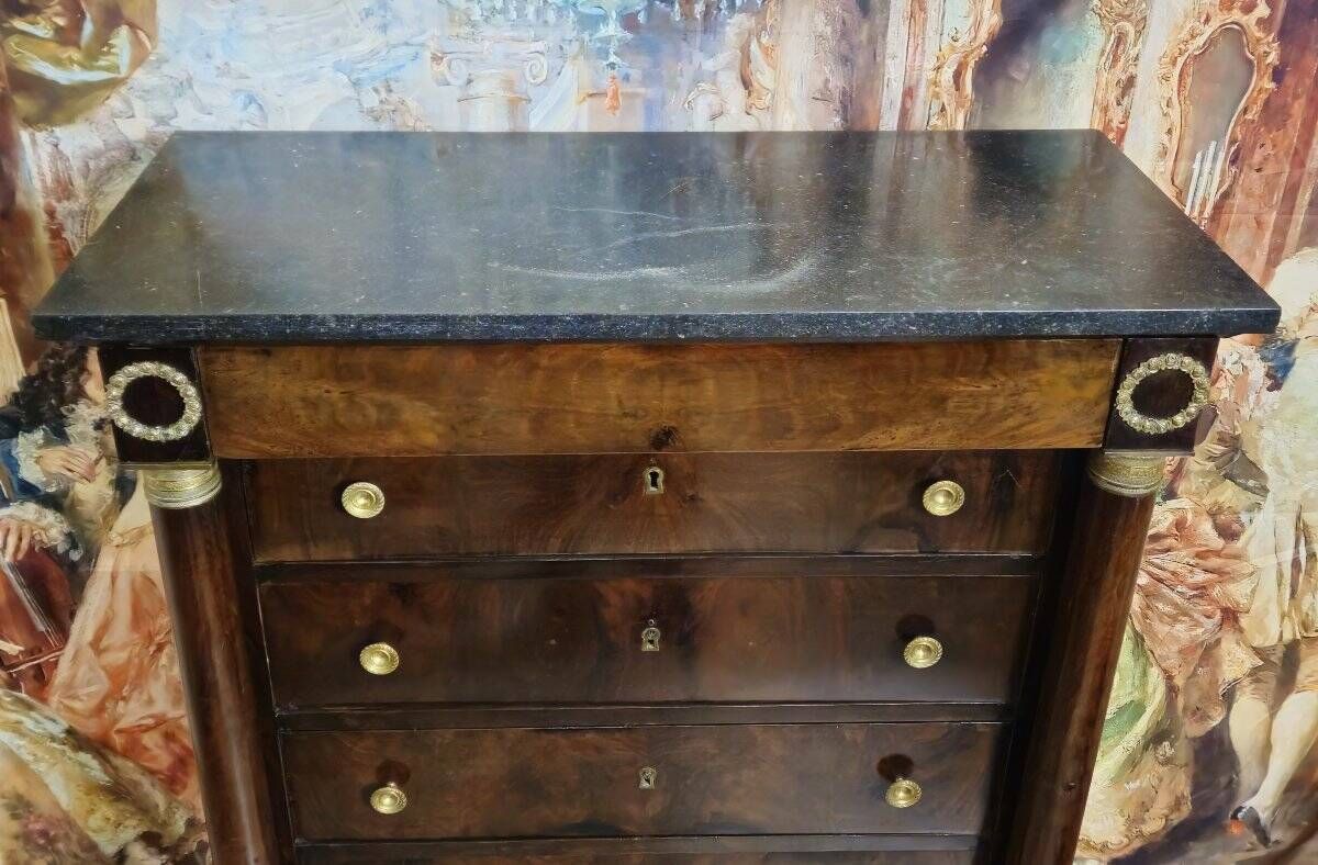 Empire period chest of drawers, early 19th century, in flame mahogany.