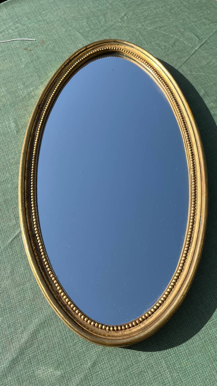 Miroir  bois doré  ovale 36 x 67 vintage