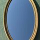 Miroir  bois doré  ovale 36 x 67 vintage