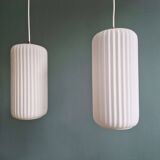 Pair of ribbed white opaline pendants, Philips, 1960s