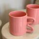 Ceramic mug with wave handle