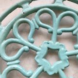Water green enamelled trivet.