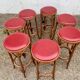 Lot de 7 tabourets de bar en bois courbé assise skaï rouge
