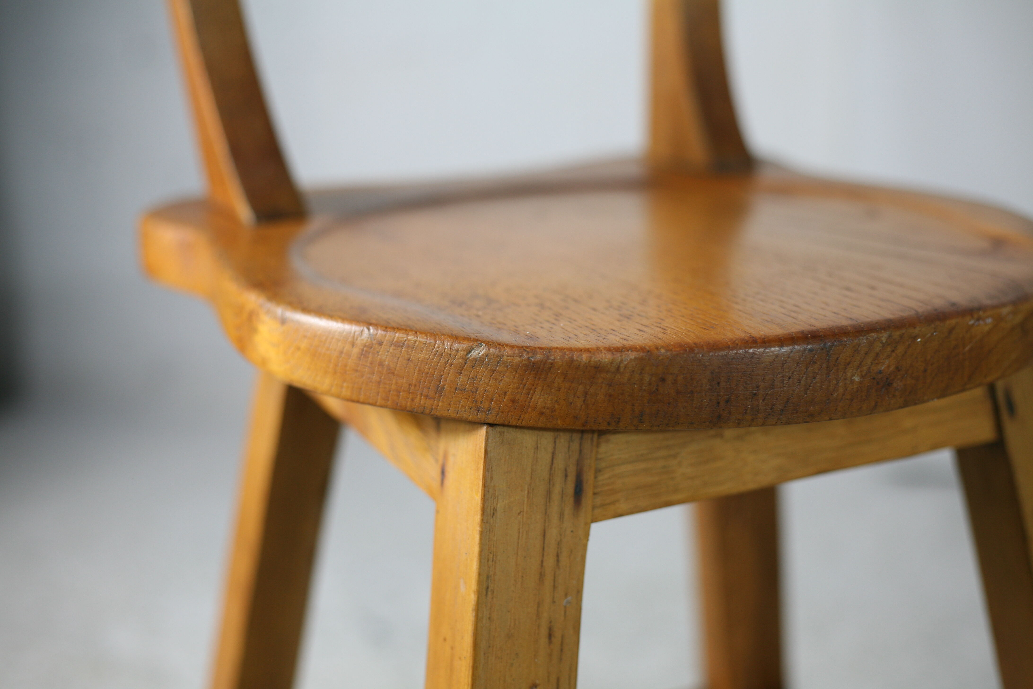 Pair of brutalist wooden back stools. France, circa 1960