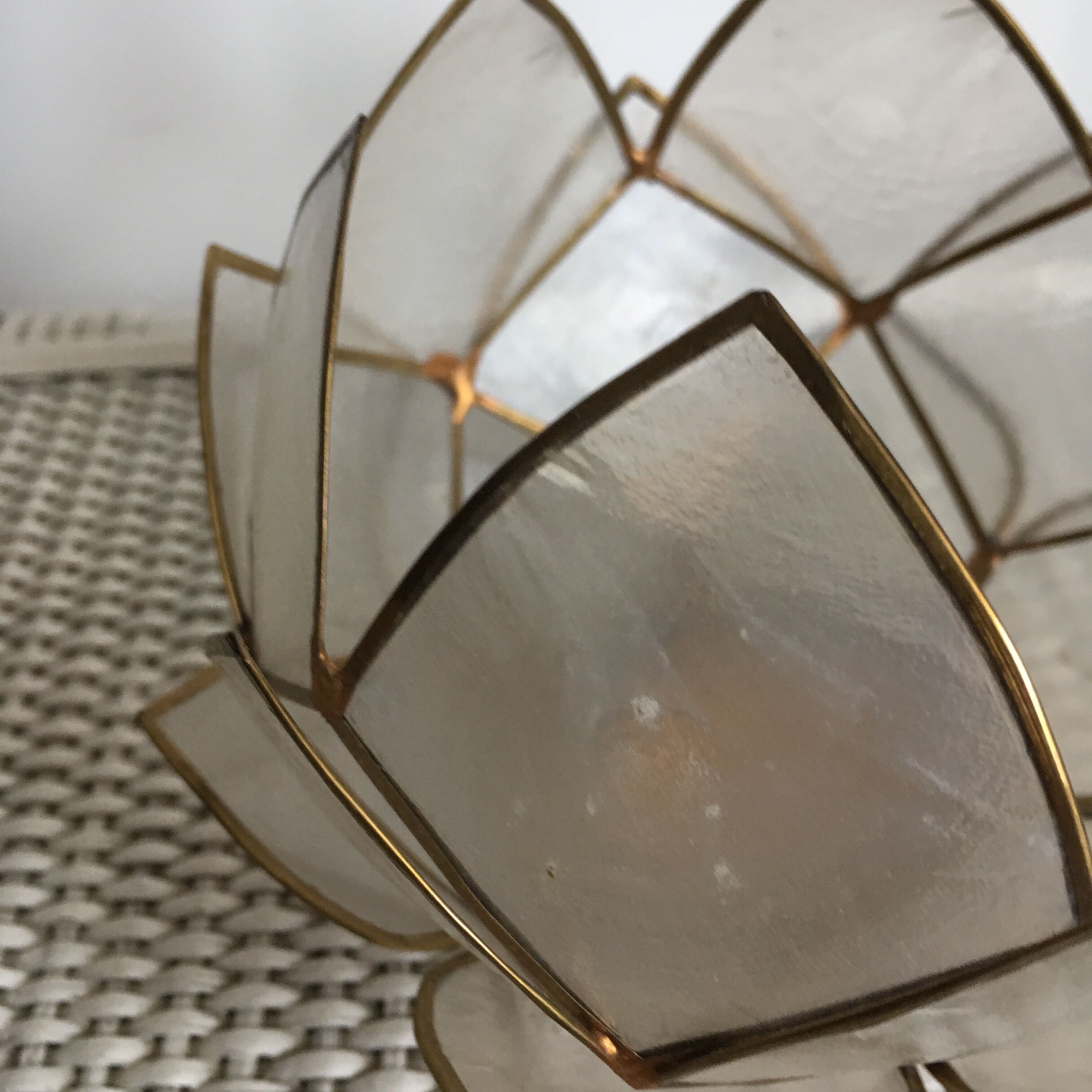 Candlestick or candle holder in nacre flower shape