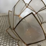 Candlestick or candle holder in nacre flower shape