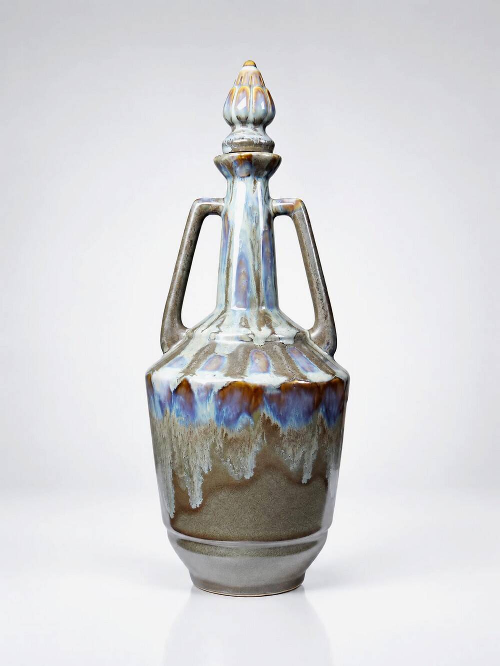 Vintage stoneware bottle with flamed glaze, France 1950-1970.