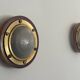 Pair of round glass wall lights, brass base and Wood Wood, 1960s, Italy.