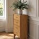Vintage chest of drawers in raw wood.