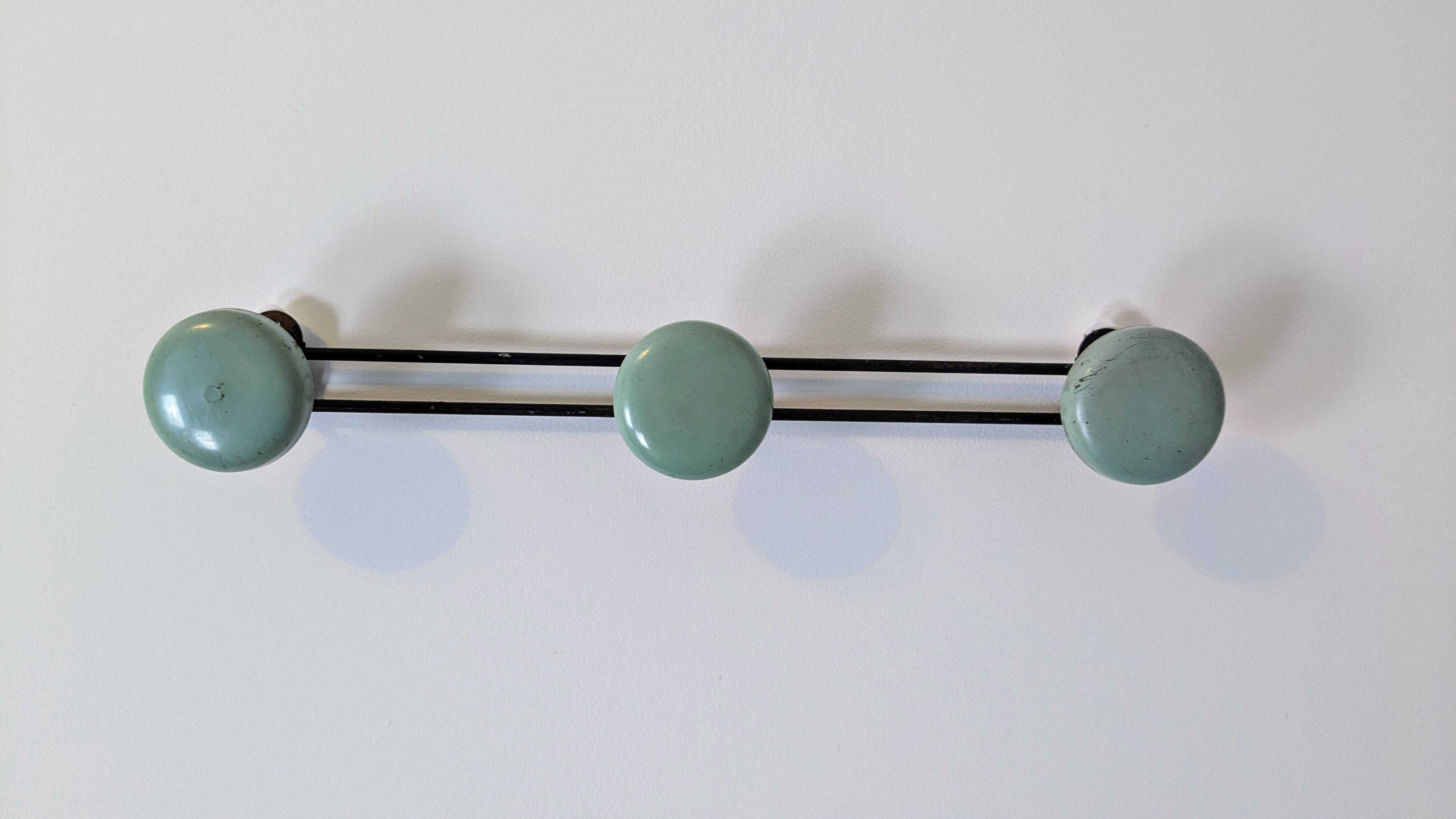 Vintage green metal triple coat hook