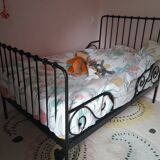 Scalable wrought iron bed with mattress