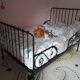 Scalable wrought iron bed with mattress