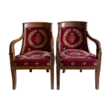 Paire de fauteuils Empire bordeaux à motif lyre , pieds sabre, accotoirs sculptés têtes de dauphin X