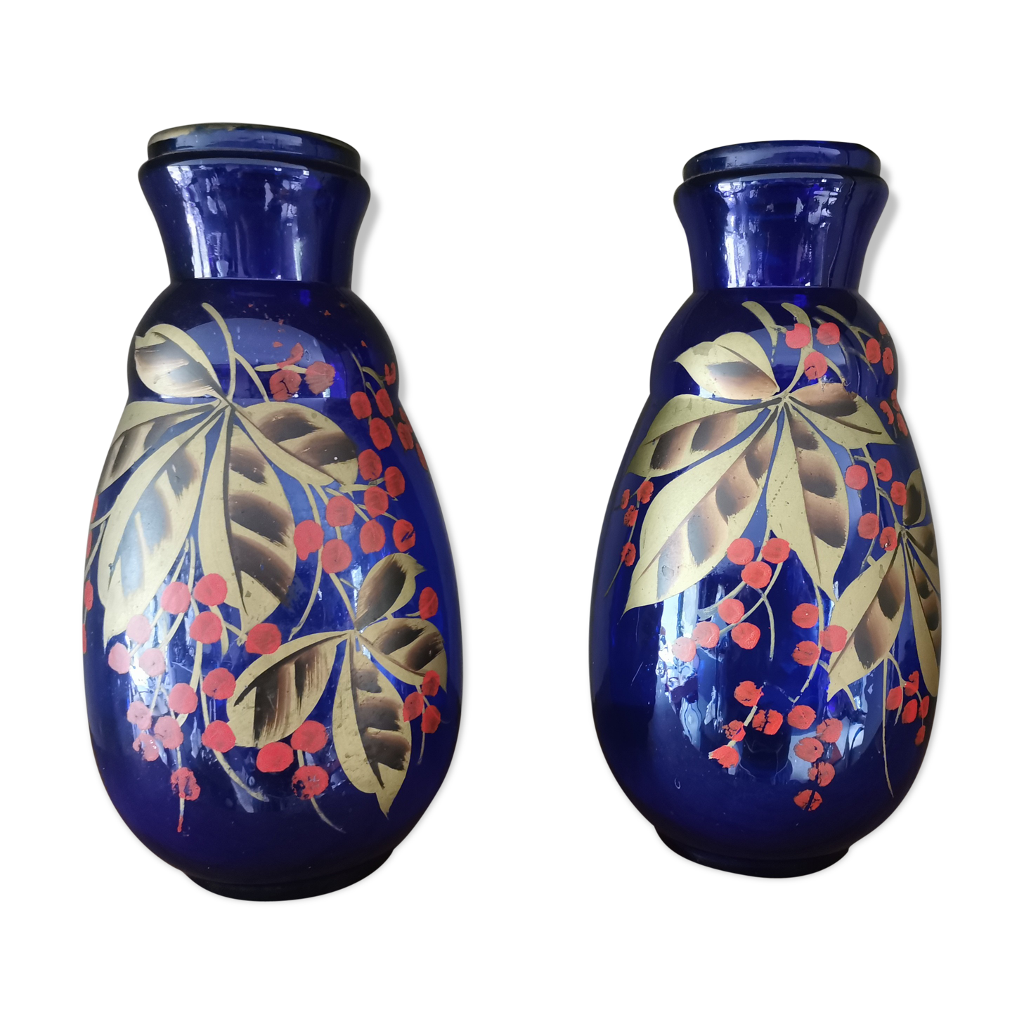 Pair of old blue painted glass vases