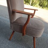 Cocktail armchair with armrests