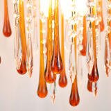 A pair of Mid Century 70's waterfall chandeliers. Murano glass amber drops. Paolo Venini style.