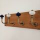 Vintage STYLE wall coat rack – purple metal and ceramic hooks