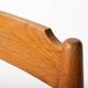 Oak chair with a black leather seat made in the 1960s