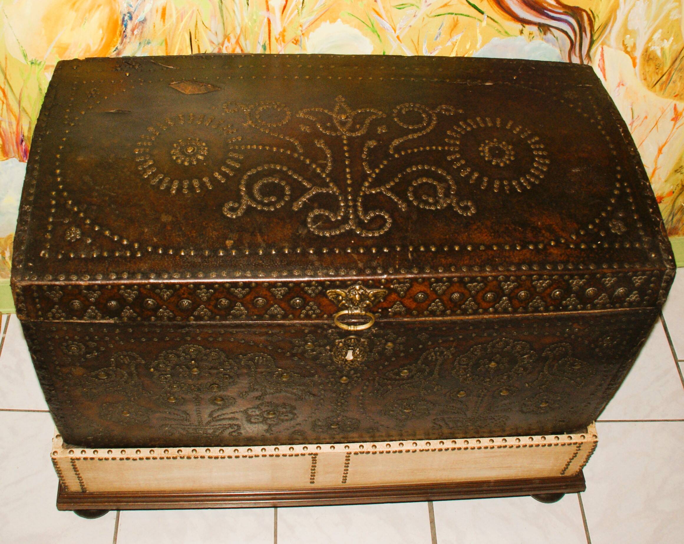 17th century studded leather travel trunk, richly decorated