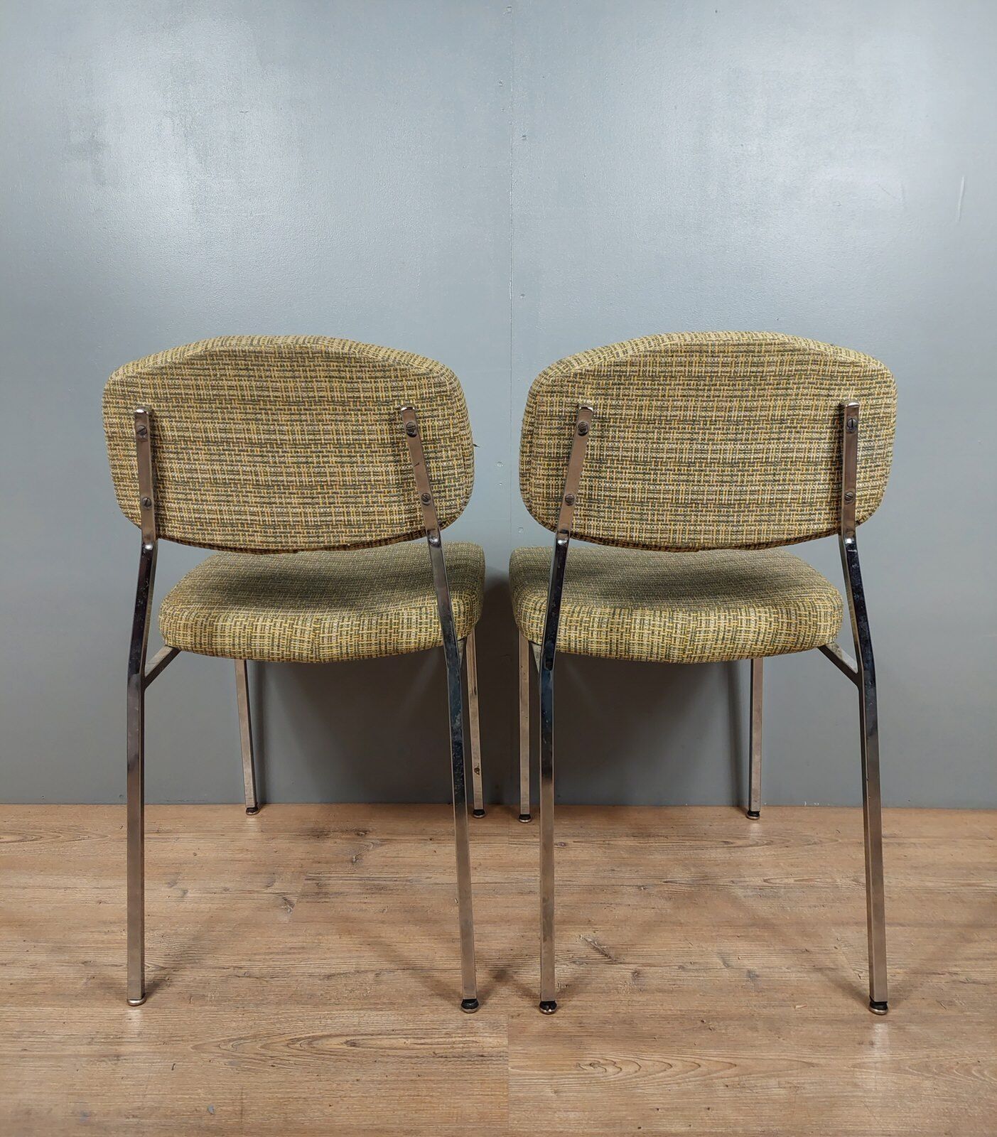 Pair of vintage chairs in fabrics and metal