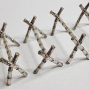 Set of six knife holders in silver metal in imitation of bamboo