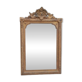 Old gilded mirror with pediment