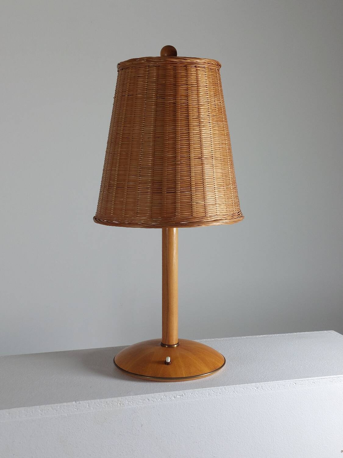 Vintage wooden and brass table lamp by Temde from the 1950s.