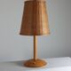 Vintage wooden and brass table lamp by Temde from the 1950s.