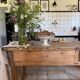Renovated raw wood farmhouse table