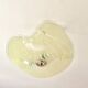 Pale yellow asymmetrical suspension cup 1960