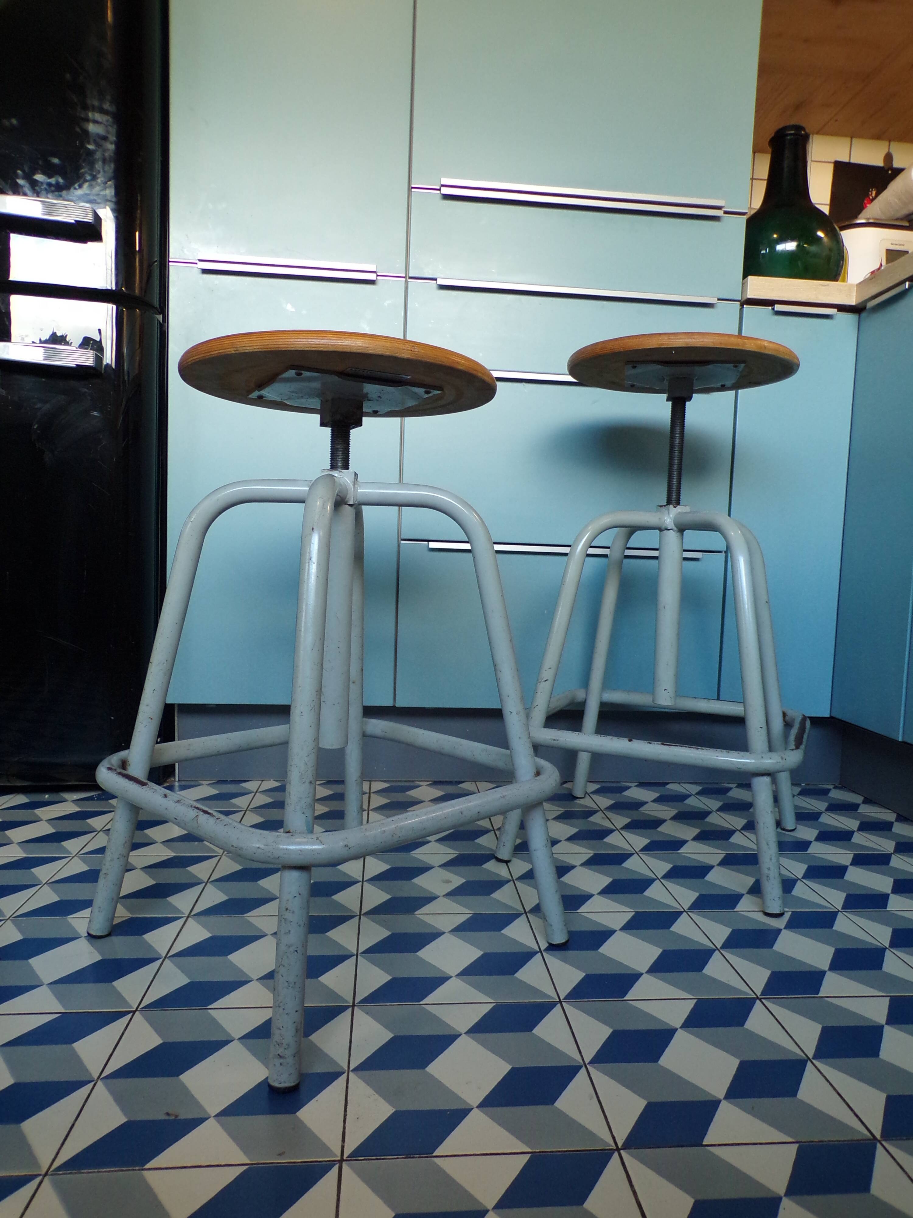 Pair of Unic screw workshop stools