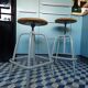 Pair of Unic screw workshop stools