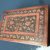 Old box in chiseled and carved brass