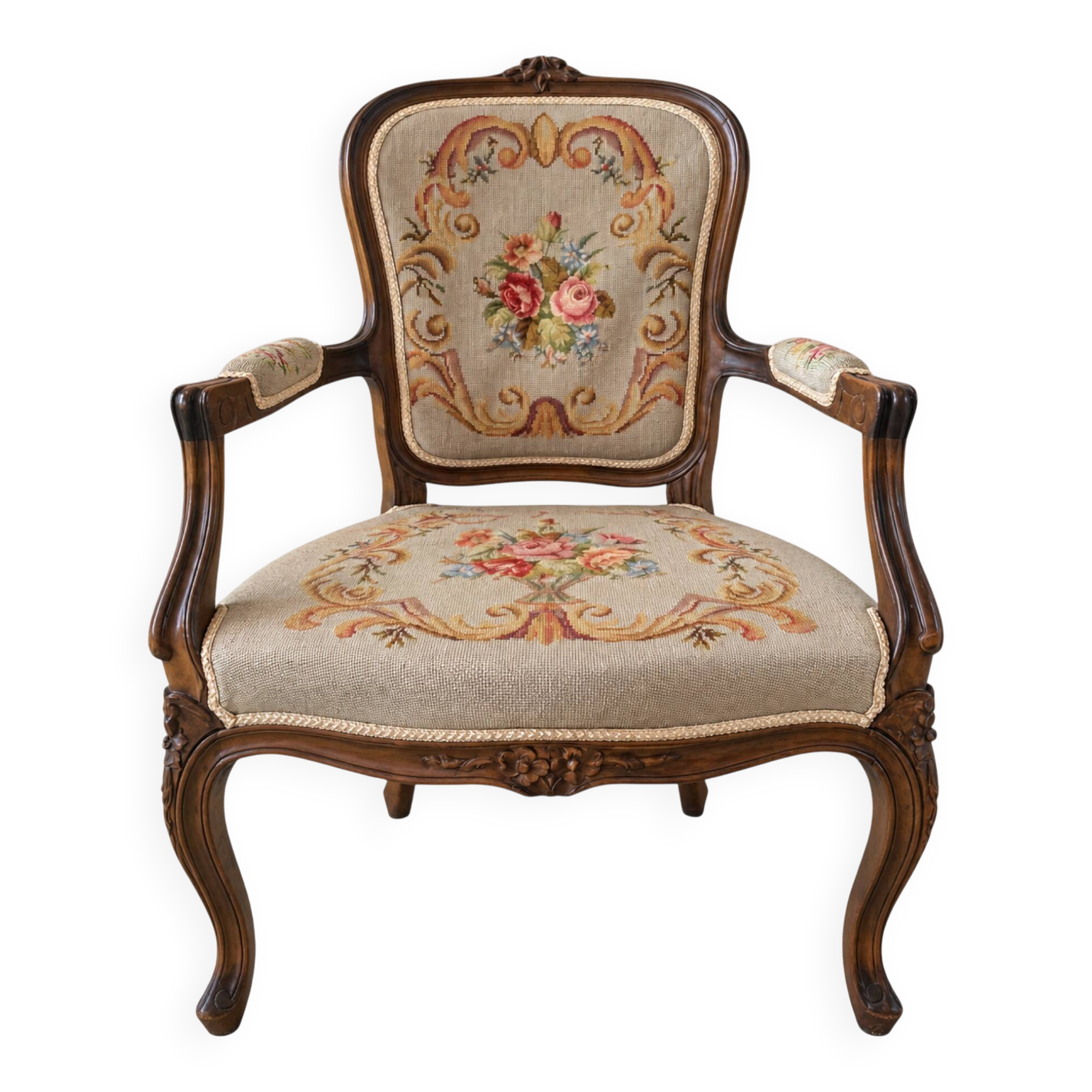 Louis XV style carved wooden armchair with floral needlepoint upholste