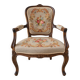 Louis XV style carved wooden armchair with floral needlepoint upholste