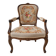 Louis XV style carved wooden armchair with floral needlepoint upholste