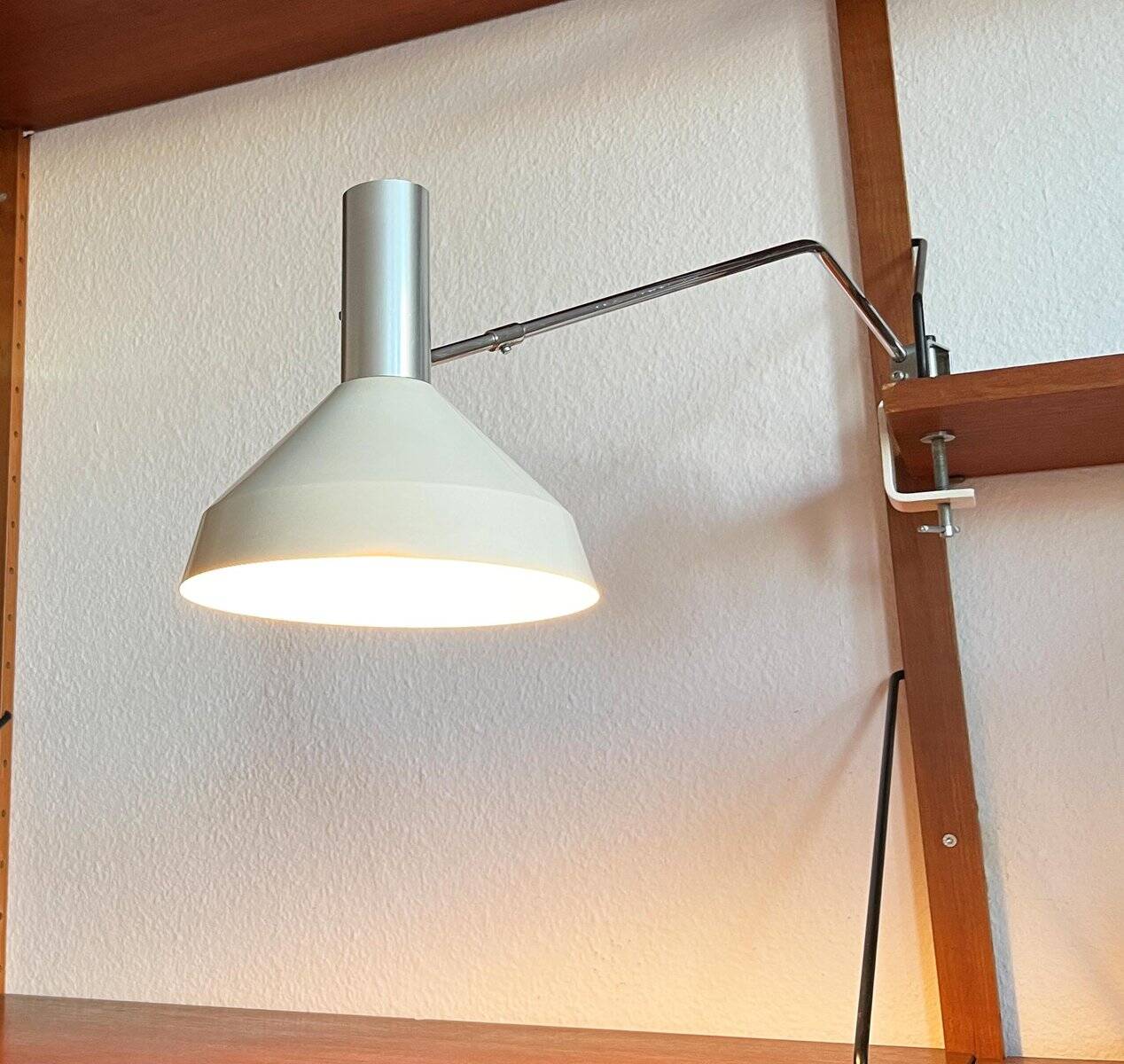 Mid-century minimalist Swiss table lamp with a clamp by Rosemarie and Rico Baltensweiler for Baltensweiler, 1950s.