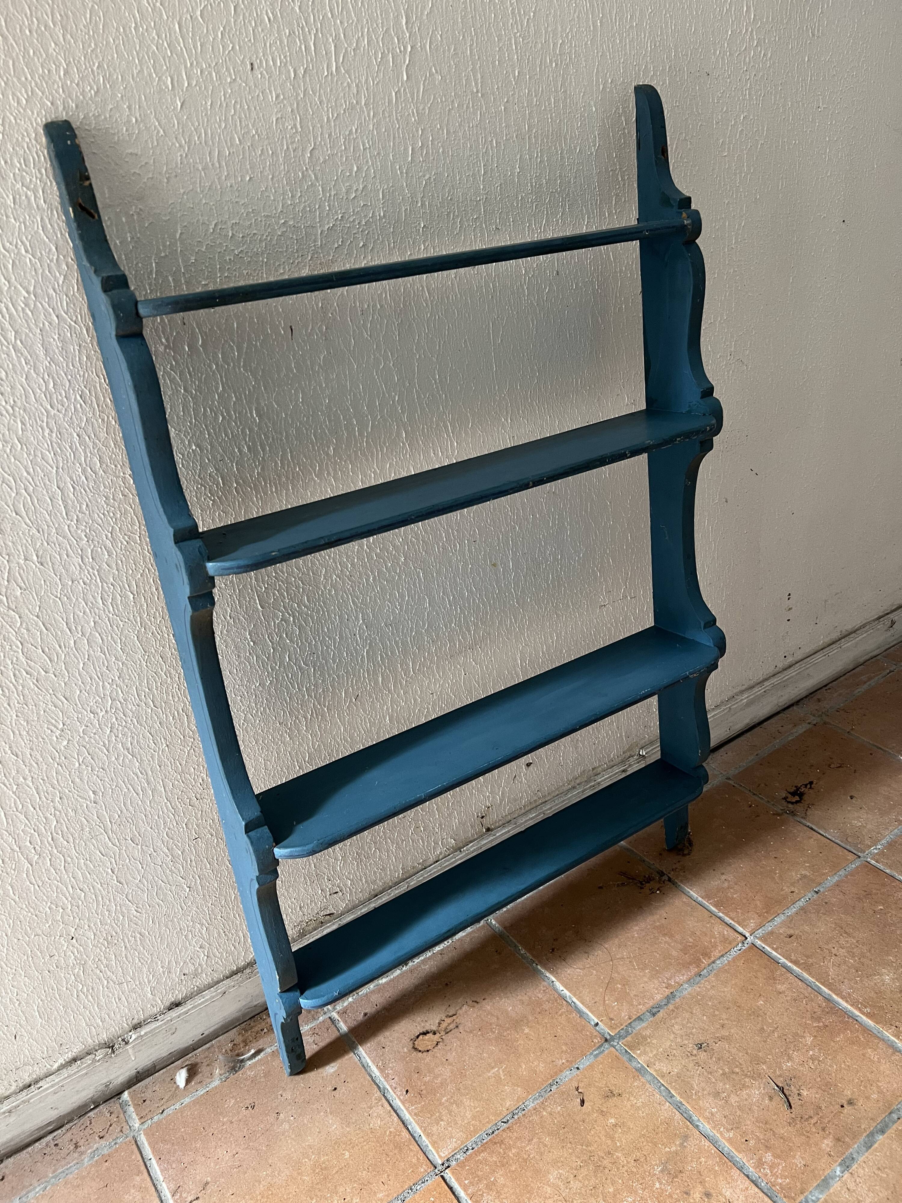 Blue wooden wall shelf