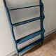 Blue wooden wall shelf