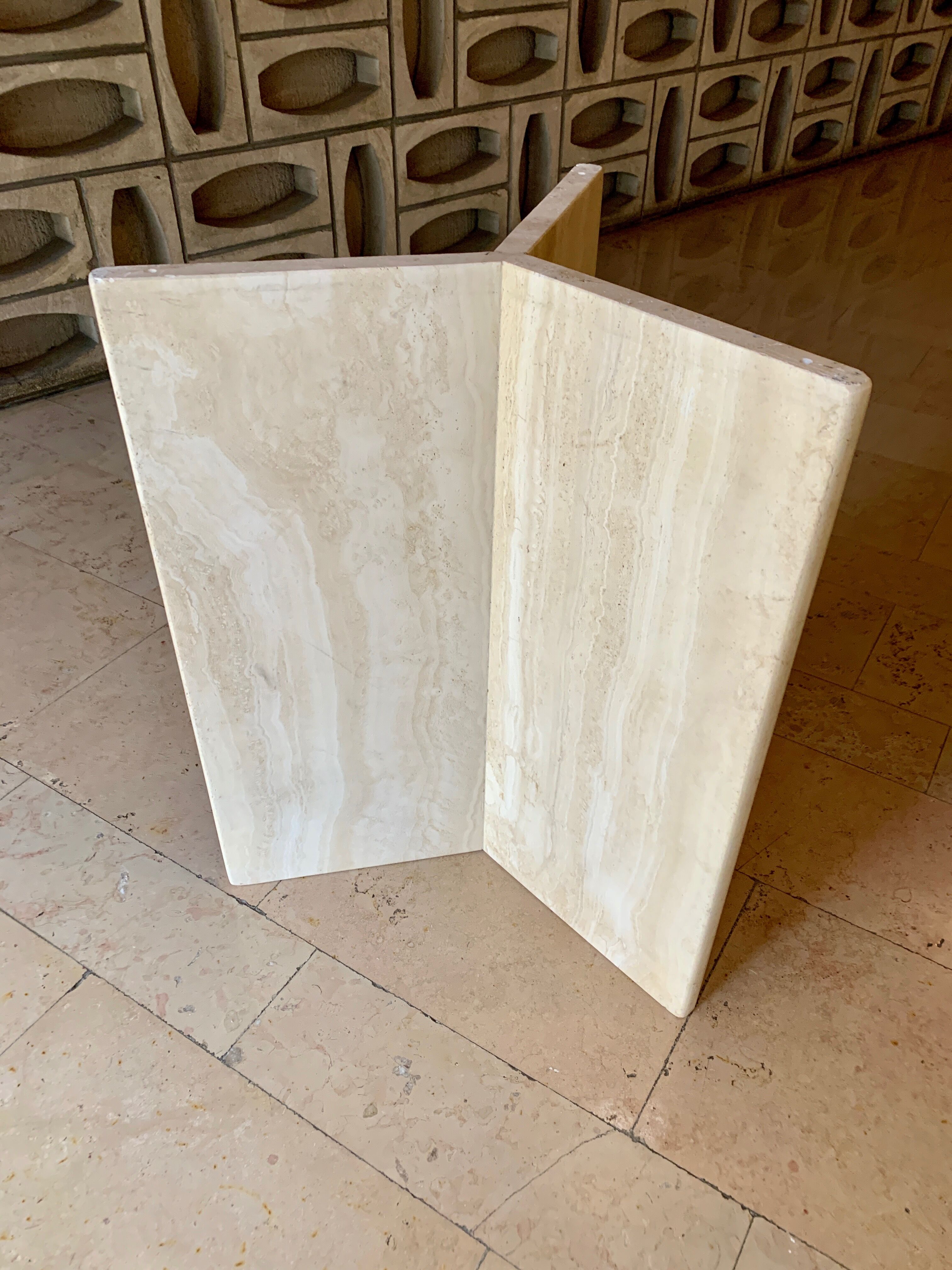 Round travertine dining table
