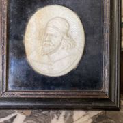 Sculpted ivory portrait suite, England circa 1880, sold in accordance with CITES regulations.