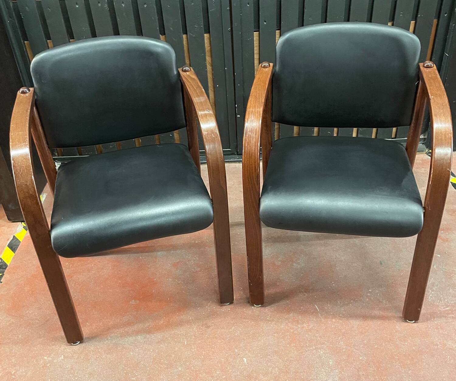 Pair of wooden and leatherette armchairs from the 80s