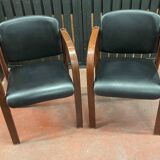 Pair of wooden and leatherette armchairs from the 80s