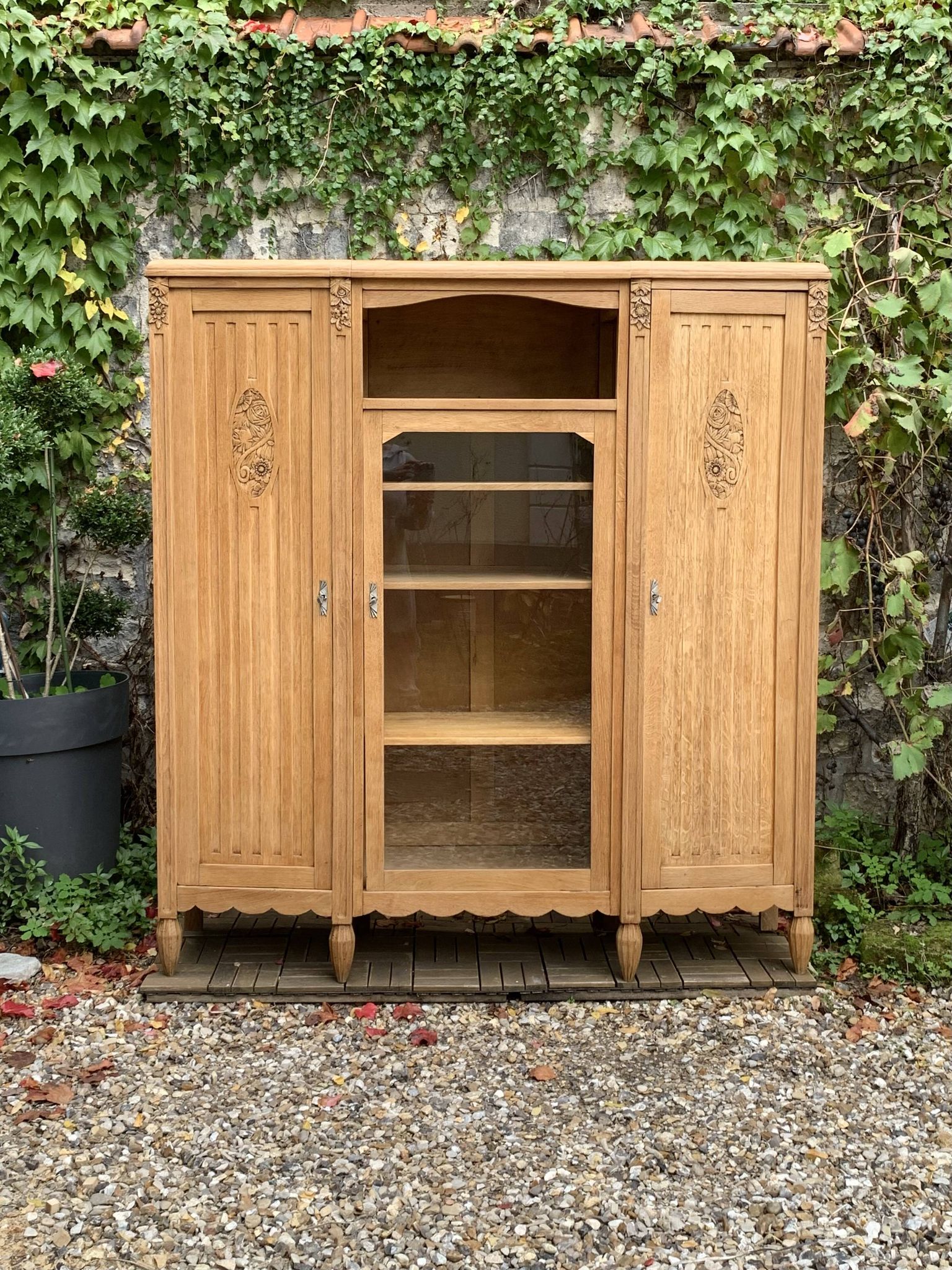 Asymmetrical Art Deco glass-fronted Parisian wardrobe in raw oak, 1930.
