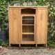 Asymmetrical Art Deco glass-fronted Parisian wardrobe in raw oak, 1930.