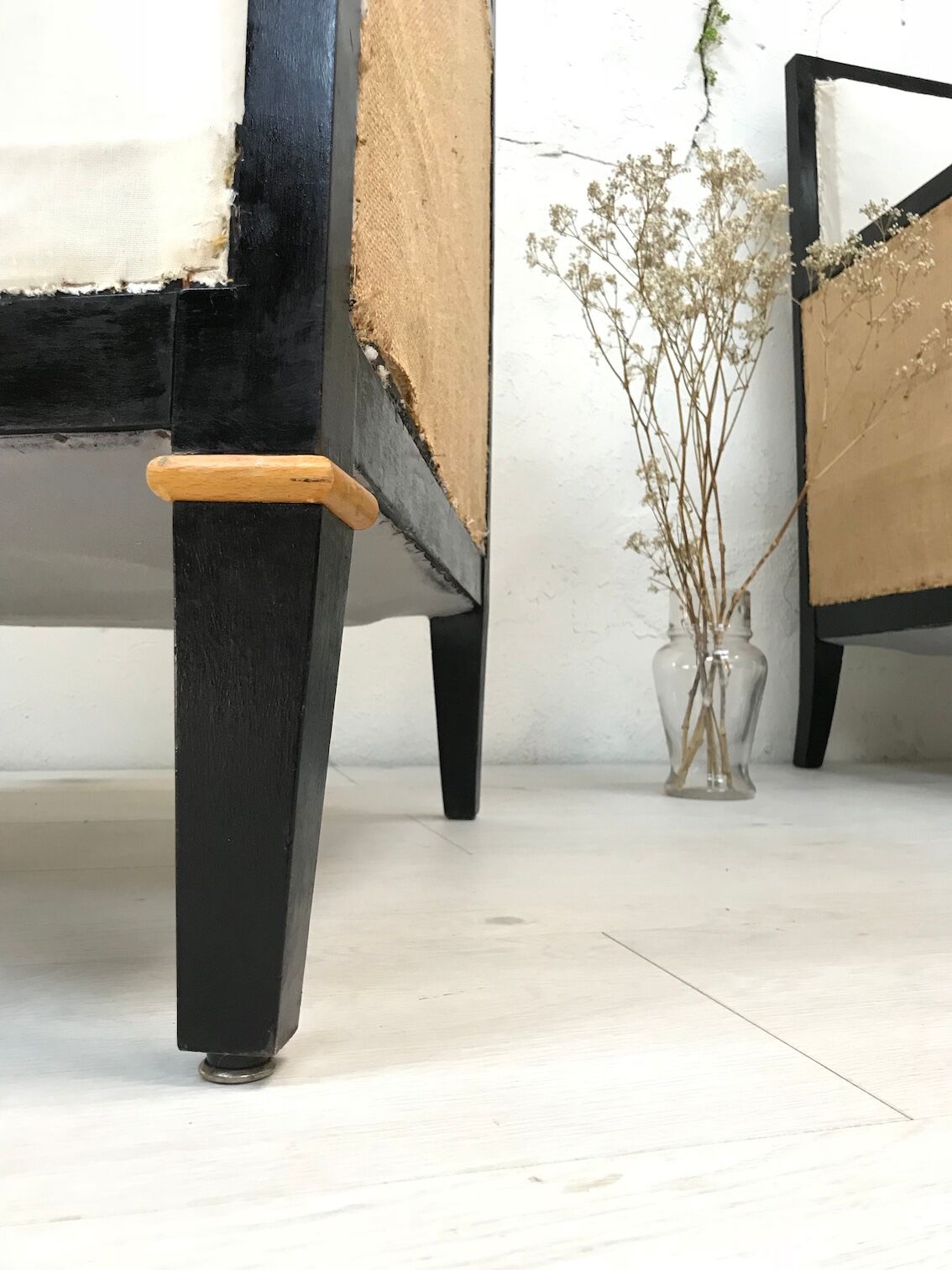 Pair of blackened wooden armchairs