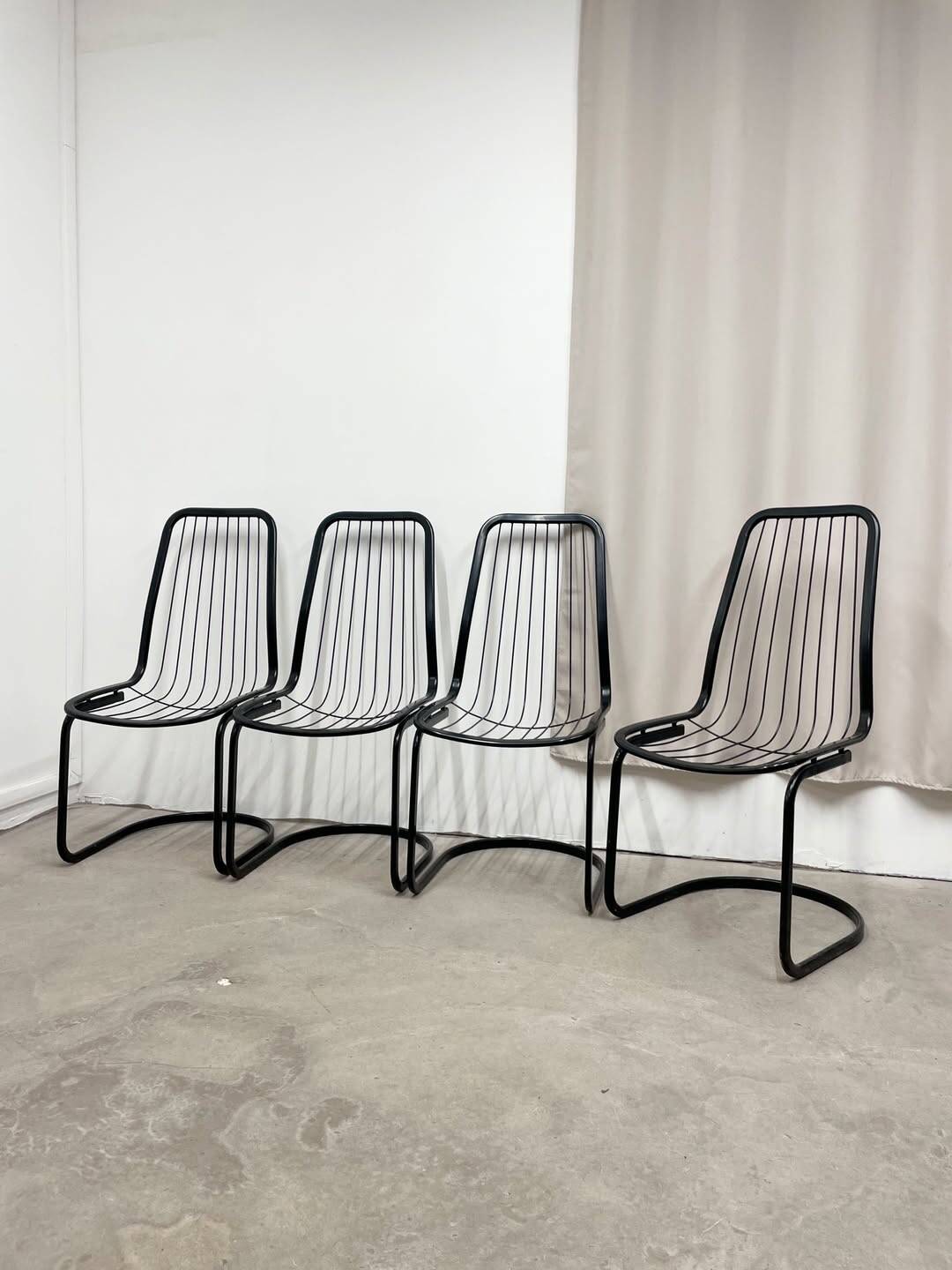 4 black wire metal chairs