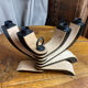 Foldable and deconstructed chandelier, minimalist Swedish design in wood.